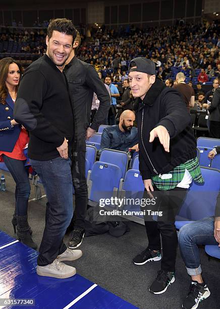 Michael Ballack and Mesut Ozil attend the Denver Nuggets v Indiana Pacers match as part of the NBA Global Games London 2017 at The O2 Arena on...