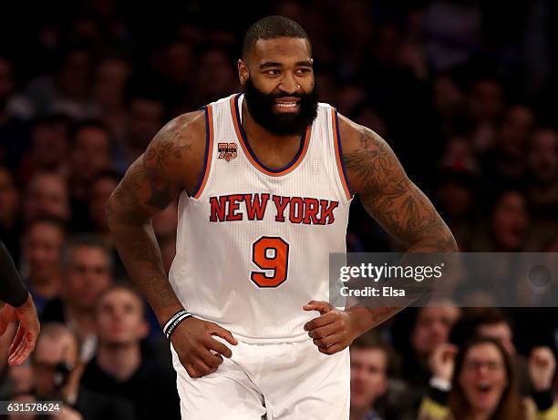 Kyle O'Quinn of the New York Knicks celebrates in the fourth quarter against the Chicago Bulls at Madison Square Garden on January 12, 2017 in New...