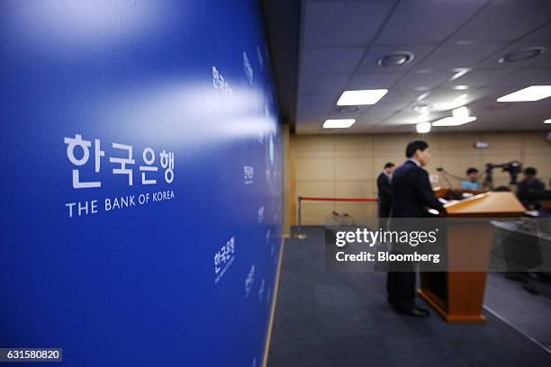 Signage for the Bank of Korea is displayed as Lee Ju Yeol, governor of the BOK, speaks during a news conference following a monetary policy meeting...