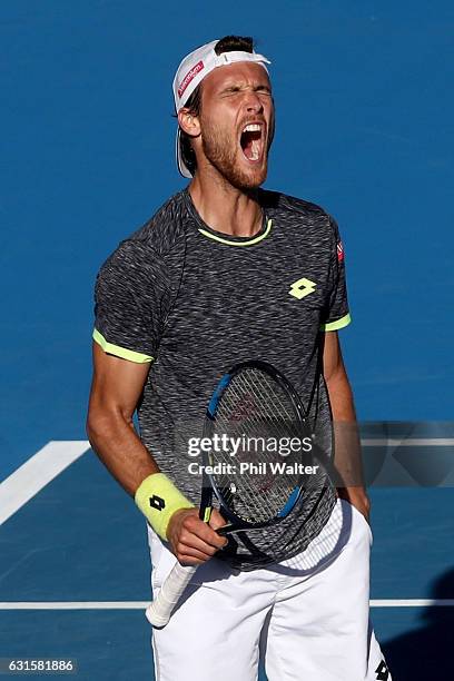 Joao Sousa of Portugal celebrates his win over Marcos Baghdatis of Cyprus on day 12 of the ASB Classic on January 13, 2017 in Auckland, New Zealand.