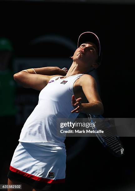 Elise Mertens of Belgium serves in her semi final match against Jana Fett of Croatia during the 2017 Hobart International at Domain Tennis Centre on...