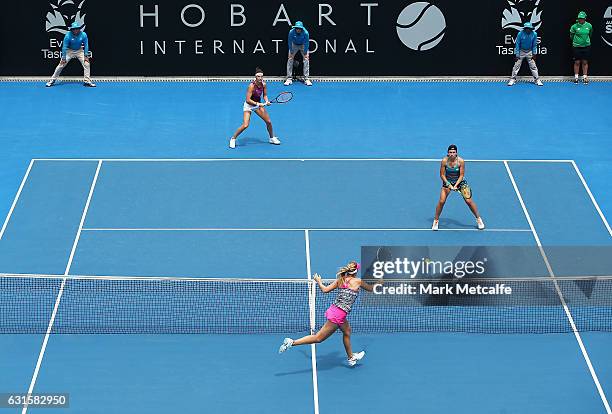 Raluca Olaru of Romania and Olga Savchuk of Ukraine play their doubles semi final match against Mandy Minella of Luxembourg and Anastasija Sevastova...