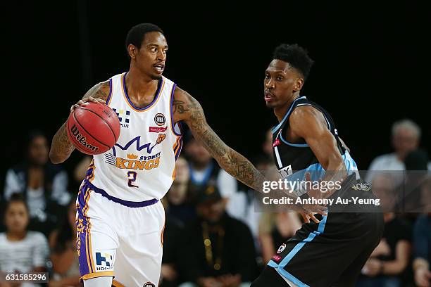 Greg Whittington of the Kings competes against Paul Carter of the Breakers during the round 15 NBL match between the New Zealand Breakers and the...
