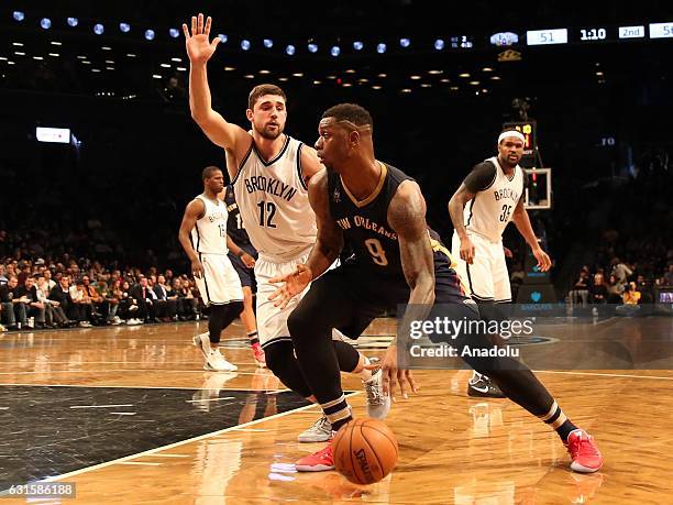 Terrence Jones of New Orleans Pelicans and Joe Harris of Brooklyn Nets during an NBA match against Brooklyn nets at Barclays Center in Brooklyn...