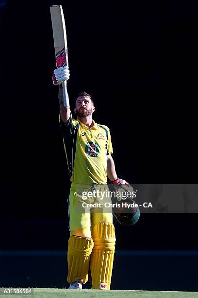 Matthew Wade of Australia celebrates his Century during game one of the One Day International series between Australia and Pakistan at The Gabba on...