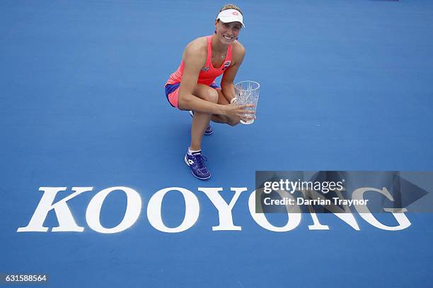 Yanina Wickmayer of Belgium holds the trophy after winning the womens final against Saurian Cirstea of Romania during day four of the 2017 Priceline...