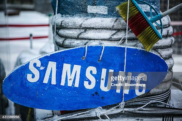 Logo for Samsung Electronics Co. Is displayed on an effigy of Jay Y. Lee, co-vice chairman of Samsung, outside the company's Seocho office building...