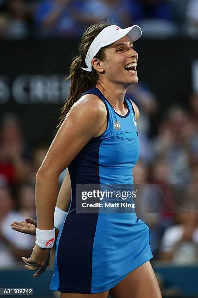 Johanna Konta of Great Britain celebrates winning match point in the Womens Final match against Agnieszka Radwanska of Poland during the Sydney...