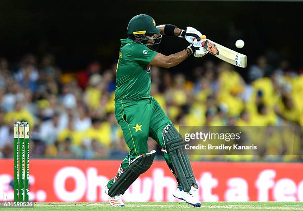 Umar Akmal of Pakistan plays a shot during game one of the One Day International series between Australia and Pakistan at The Gabba on January 13,...