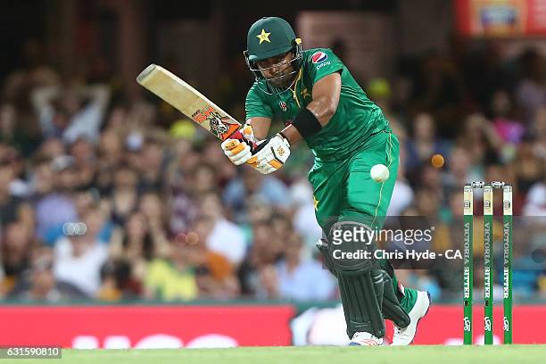 Umar Akmal of Pakistan bats during game one of the One Day International series between Australia and Pakistan at The Gabba on January 13, 2017 in...
