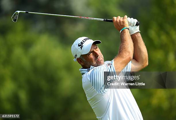 Hennie Otto of South Africa hits his second shot on the 18th hole during day two of The BMW South African Open Championship at Glendower Golf Club on...