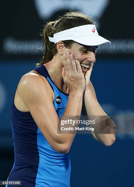 Johanna Konta of Great Britain celebrates winning match point in the Womens Final match against Agnieszka Radwanska of Poland during the Sydney...