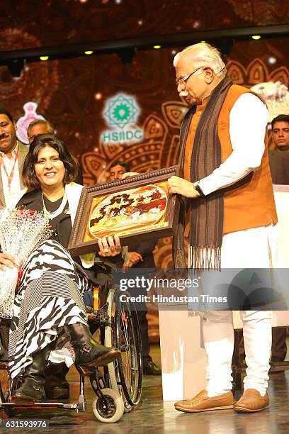 Olympic Medalist Deepa Malik with Haryana CM Manohar Lal Khattar during the first Pravasi Haryana Divas, organised by Government of Haryana with...