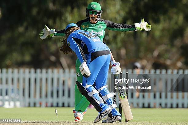 Emma Inglis of the Stars reacts as Alex Price of the Strikers is bowled out during the Women's Big Bash League match between the Adelaide Strikers...