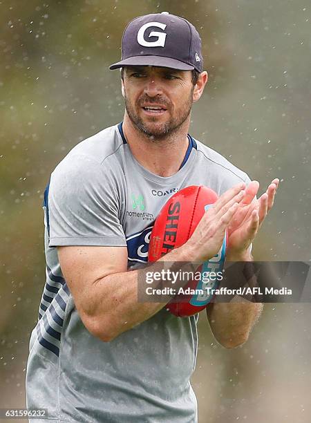 Matthew Scarlett, Assistant Coach of the Cats looks on during the Geelong Cats training session at Deakin University, Waurn Ponds on January 13, 2017...