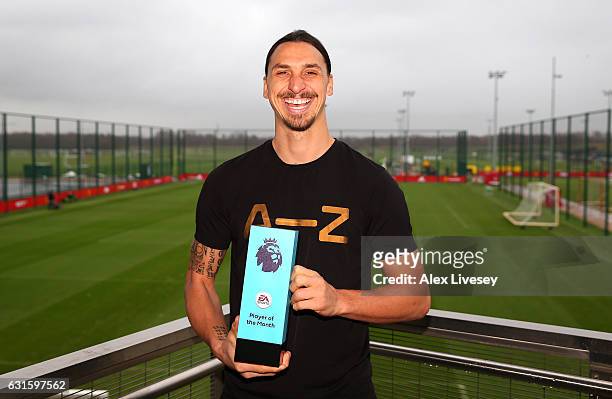 Zlatan Ibrahimovic of Manchester United is presented with the EA Premier League Player of the Month Award at Aon Training Complex on January 12, 2017...