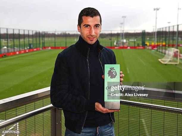 Henrikh Mkhitaryan of Manchester United is presented with the Carling Premier League Goal of the Month Award at Aon Training Complex on January 12,...