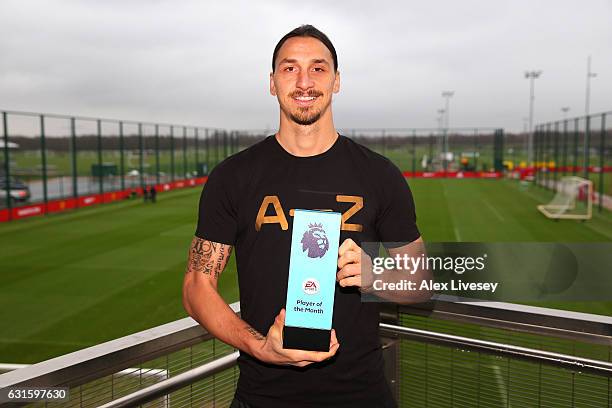 Zlatan Ibrahimovic of Manchester United is presented with the EA Premier League Player of the Month Award at Aon Training Complex on January 12, 2017...