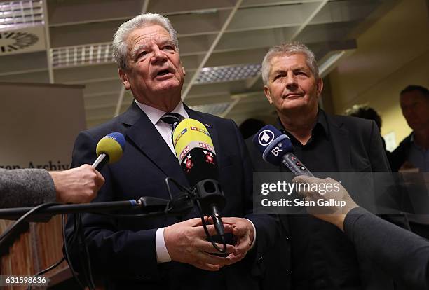 German President Joachim Gauck and Roland Jahn, who is Federal Commisisoner of the BStU, the federal archive of the Stasi, the former East German...