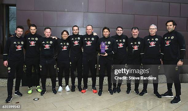 The Chelsea Manager Antonio Conte poses with the Premier League Manager of the Month Award for December 2016 at Chelsea Training Ground on January...