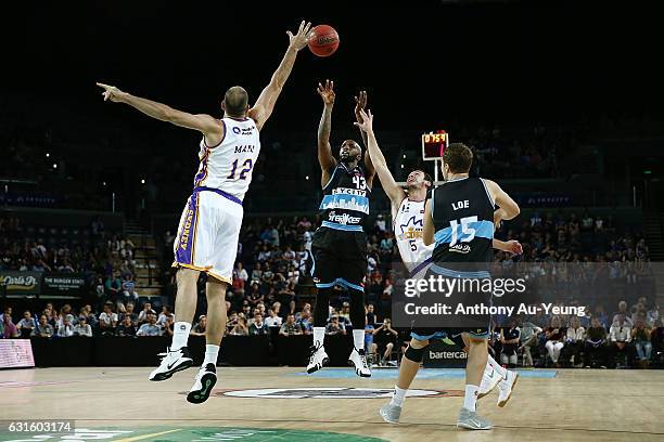 Kevin Dillard of the Breakers takes a three pointer against Aleks Maric of the Kings during the round 15 NBL match between the New Zealand Breakers...