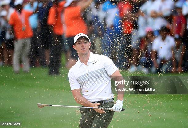 Rory McIlroy of Northern Ireland plays out of the sand on the 18th hole during day two of The BMW South African Open Championship at Glendower Golf...