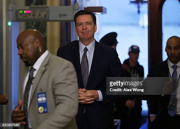 Director James Comey arrives at the U.S. Capitol for a classified briefing on Russia for all members of the House of Representatives January 13, 2017...