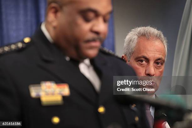 Chicago Mayor Rahm Emanuel listens as Police Superintendent Eddie Johnson speaks at a press conference called by U.S. Attorney General Loretta Lynch...