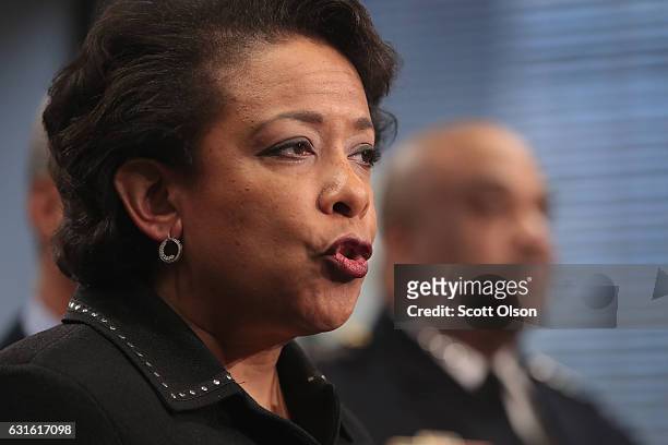 Chicago Police Superintendent Eddie Johnson listens as U.S. Attorney General Loretta Lynch speaks at a press conference on January 13, 2017 in...