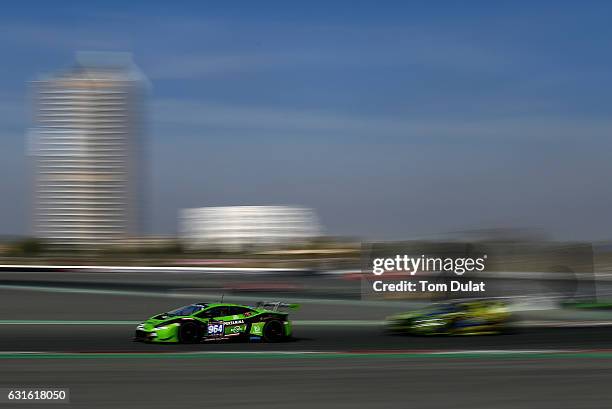 Grasser Racing Team Lamborghini Huracan GT3 of Christian Engelhart, Rolf Ineichen and Adrian Amstutz race during the Hankook 24 Hours Dubai Race in...