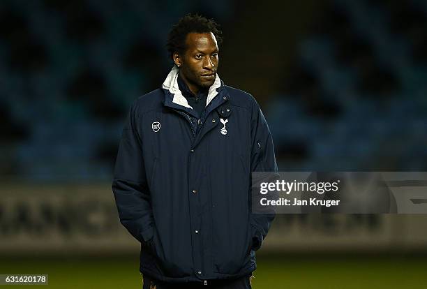 Ugo Ehiogu, coach of Tottenham Hotspur looks on as players warm up during the Premier League 2 match between Manchester City and Tottenham Hotspur at...