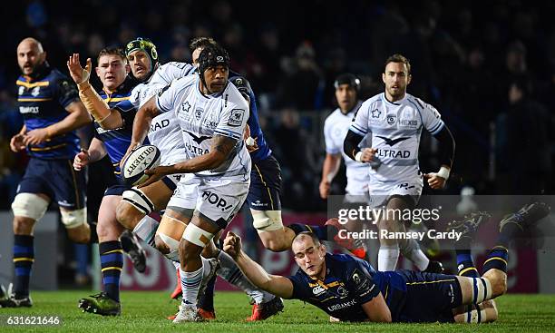 Dublin , Ireland - 13 January 2017; Akapusi Qera of Montpellier is tackled by Devin Toner of Leinster during the European Rugby Champions Cup Pool 4...