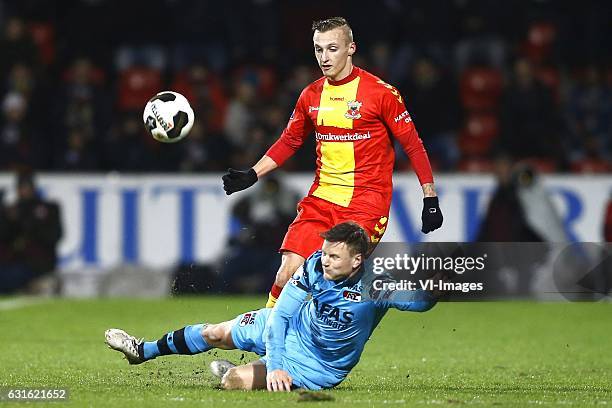 Mattias Johansson of AZ Alkmaar, Marcel Ritzmaaier of Go Ahead Eaglesduring the Dutch Eredivisie match between Go Ahead Eagles and AZ Alkmaar at The...