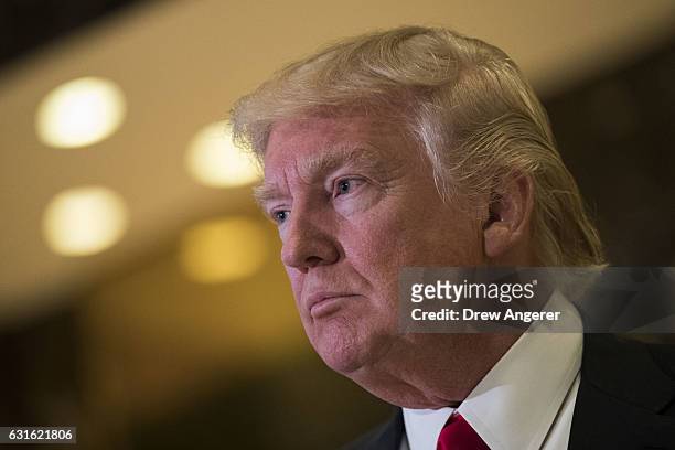 President-elect Donald Trump speaks to reporters after his meeting with television personality Steve Harvey at Trump Tower, January 13, 2017 in New...