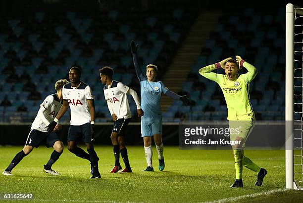Angus Gunn of Manchester City looks on dejected after the equalizer by Shilow Tracey of Tottenham Hotspur during the Premier League 2 match between...