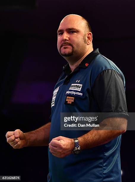 Scott Waites of England reacts during his Mens Quarter Final match against Danny Noppert of the Netherlands on day seven of the BDO Lakeside World...