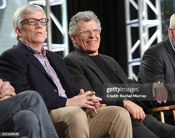 Executive producer Peter Tolan and director Jon Amiel speak during the "Outsiders" panel at the WGN America Winter TCA at Langham Hotel on January...