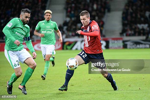 Nicolas De Preville of Lille Loic Perrin of Saint Etienne during the Ligue 1 match between Liile OSC and As Saint Etienne at Stade Pierre-Mauroy on...