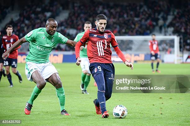 Yassine Benzia of Lille Kevin Theophile Catherine of Saint Etienne during the Ligue 1 match between Liile OSC and As Saint Etienne at Stade...