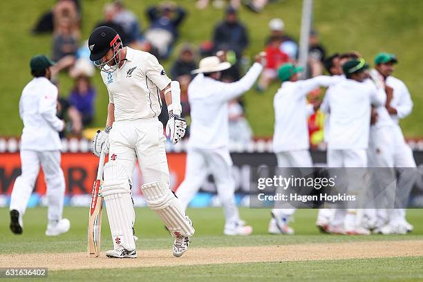 Kane Williamson of New Zealand leaves the field after being dismissed during day three of the First Test match between New Zealand and Bangladesh at...