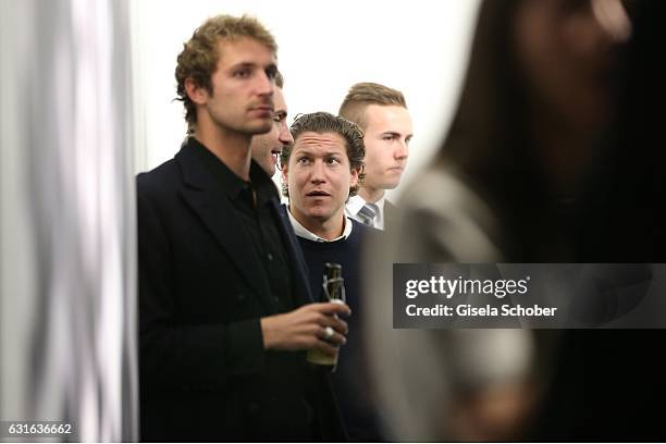 Theo Niarchos and his brother Stavros Niarchos III. And Vito Schnabel during the 'Jeff Elrod Figment' exhibition at Vito Schnabel Gallery on December...
