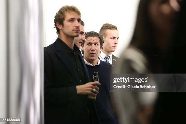 Theo Niarchos and his brother Stavros Niarchos III. And Vito Schnabel during the 'Jeff Elrod Figment' exhibition at Vito Schnabel Gallery on December...