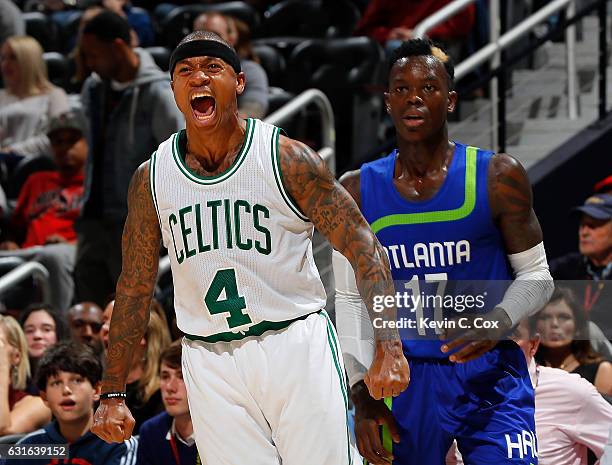 Isaiah Thomas of the Boston Celtics reacts after hitting a three-point basket against the Dennis Schroder of the Atlanta Hawks at Philips Arena on...