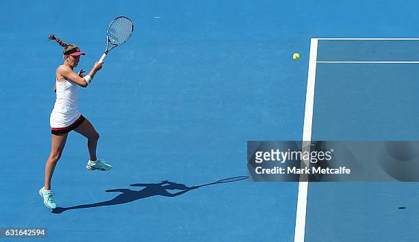 Elise Mertens of Belgium plays a forehand in her final match against Monica Niculescu of Romania during the 2017 Hobart International at Domain...