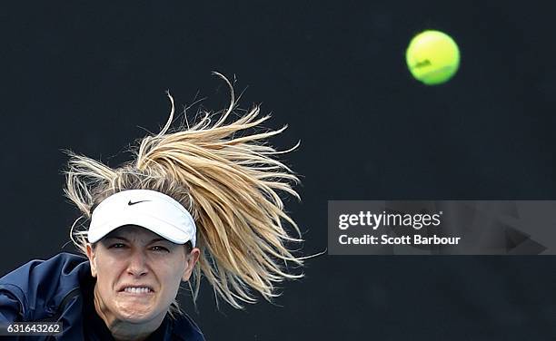 Eugenie Bouchard of Canada serves during a practice session ahead of the 2017 Australian Open at Melbourne Park on January 14, 2017 in Melbourne,...