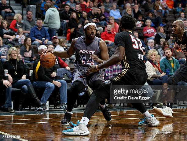 Marcus Posley from the Sioux Falls Skyforce looks for a teammate against the Erie Bayhawks at the Sanford Pentagon January 13, 2017 in Sioux Falls,...