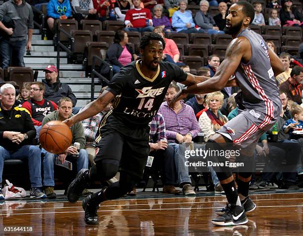 Kalin Lucas from the Erie Bayhawks drives past Keith Benson from the Sioux Falls Skyforce at the Sanford Pentagon January 13, 2017 in Sioux Falls,...