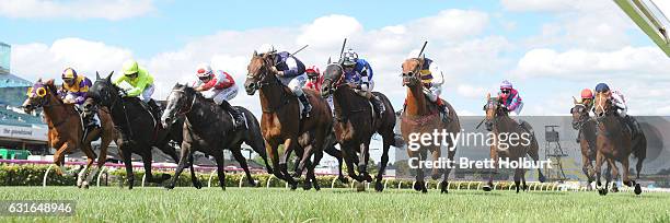 Kourkam ridden by Sairyn Fawke wins Craftsman Handicap at Flemington Racecourse on January 14, 2017 in Flemington, Australia.