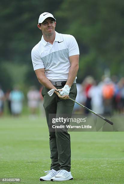 Rory McIlroy of Northern Ireland reacts to a poor shot on the fourth hole during the second round of the BMW South African Open Championship at...