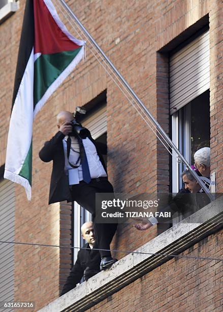 Palestinian photograpfer try to shots pictures of president Mahmud Abbas after the inauguration of the new Palestinian diplomatic mission to the Holy...